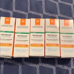 FIVE OUTDATED La Roche Anthelios Clear Skin.